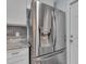 Stainless steel refrigerator with ice and water dispenser in kitchen at 4689 Carmel St, Orlando, FL 32808