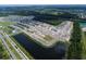 Aerial view of community and surrounding landscape at 5106 Rain Shadow Dr, Saint Cloud, FL 34772