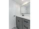 Bathroom with gray vanity and quartz countertop at 5341 Bamboo Ct # 418, Orlando, FL 32811