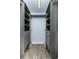 Walk-in closet with ample shelving and drawers at 5341 Bamboo Ct # 418, Orlando, FL 32811