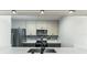 Modern kitchen with stainless steel appliances and quartz countertops at 5341 Bamboo Ct # 418, Orlando, FL 32811