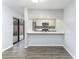 Updated kitchen with white cabinets and quartz countertops at 5341 Bamboo Ct # 418, Orlando, FL 32811