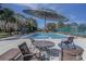 Relaxing pool area with patio furniture at 5341 Bamboo Ct # 418, Orlando, FL 32811