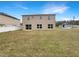 Large backyard with grassy area at 544 Viceroy Ct, Kissimmee, FL 34758