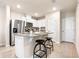 Modern kitchen with stainless steel appliances and island at 5649 Brosnan Rd, St Cloud, FL 34771