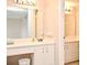 Bathroom with a double sink vanity and tiled floor at 669 Grenadine Ct # S, Winter Park, FL 32792