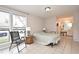 Bedroom with a bed, chair, and view of the street at 669 Grenadine Ct # S, Winter Park, FL 32792