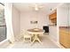 Charming dining area with a round table and chairs at 669 Grenadine Ct # S, Winter Park, FL 32792