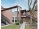 Exterior view of condo building with stairs and landscaping at 669 Grenadine Ct # S, Winter Park, FL 32792