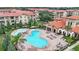 Community overview showing a large pool, spa, and buildings at 914 Charo Pkwy # 113, Davenport, FL 33897