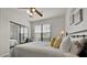 Guest bedroom with two full beds, window, and ceiling fan at 914 Charo Pkwy # 113, Davenport, FL 33897