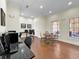 Business center with computers, printer, and comfortable seating area at 914 Charo Pkwy # 113, Davenport, FL 33897