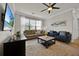 Spacious living room with comfy couches and large TV at 914 Charo Pkwy # 113, Davenport, FL 33897