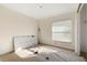Under-construction bedroom with new flooring and window blinds at 9405 Holbrook Dr, Orlando, FL 32817