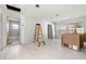 Unfinished bedroom with new tile flooring and bathroom access at 9405 Holbrook Dr, Orlando, FL 32817
