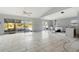 Spacious living room with new tile flooring and sliding doors at 9405 Holbrook Dr, Orlando, FL 32817