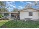 Backyard view with hammock and patio at 1 Black Jack Cir, Port Orange, FL 32128