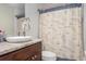 Clean bathroom with updated vanity and nautical-themed shower curtain at 1 Black Jack Cir, Port Orange, FL 32128