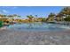 Resort-style pool with palm trees and lounge chairs at 1060 Leader St, Davenport, FL 33896