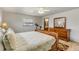 Main bedroom with hardwood floors and ensuite bathroom access at 110 Dianne Dr, Ormond Beach, FL 32176