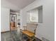 Bright entryway with a wooden bench and slate tile floor at 110 Dianne Dr, Ormond Beach, FL 32176