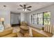 Living room featuring hardwood floors and wicker furniture at 110 Dianne Dr, Ormond Beach, FL 32176