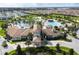 Aerial view of community clubhouse and resort-style pool at 1176 Challenge Dr, Davenport, FL 33896