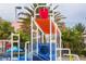 Colorful water play area with tipping buckets and water features at 1176 Challenge Dr, Davenport, FL 33896