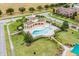 Community pool and surrounding area from above at 12002 Great Commission Way, Orlando, FL 32832