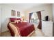 Bedroom with a double bed and white dresser at 12002 Great Commission Way, Orlando, FL 32832