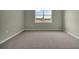 Empty bedroom with neutral walls and carpet at 1232 White Ash Loop, Deland, FL 32720