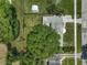 Aerial view showing house and large backyard at 124 Mercado Ave, Orlando, FL 32807