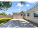 Large backyard with patio, providing ample outdoor space at 124 Mercado Ave, Orlando, FL 32807