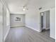 Bright bedroom with ceiling fan and new flooring at 124 Mercado Ave, Orlando, FL 32807