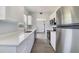 Updated kitchen featuring stainless steel appliances and white cabinetry at 124 Mercado Ave, Orlando, FL 32807