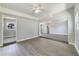 Open living room with hardwood floors and access to other areas at 124 Mercado Ave, Orlando, FL 32807