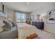 Serene bedroom featuring wood frame bed and neutral tones at 1244 White Ash Loop, Deland, FL 32720