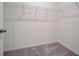 Walk-in closet with wire shelving and neutral carpet at 1244 White Ash Loop, Deland, FL 32720