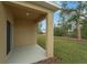 Covered patio with access to the backyard at 1244 White Ash Loop, Deland, FL 32720