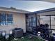 Backyard with AC unit and screened porch at 1332 Azalea Way, Winter Garden, FL 34787