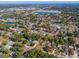 Aerial view of neighborhood, showcasing surrounding homes and landscape at 137 N Nowell St, Orlando, FL 32835