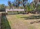 Large backyard with fenced perimeter, providing ample outdoor space at 137 N Nowell St, Orlando, FL 32835