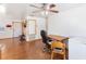 Simple dining space with a desk and chair near kitchen at 137 N Nowell St, Orlando, FL 32835