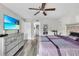 Main bedroom with large dresser and en-suite bathroom at 144 Maitland Ave # A, Altamonte Springs, FL 32701