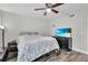 Bedroom with ceiling fan, dresser and TV at 144 Maitland Ave # A, Altamonte Springs, FL 32701