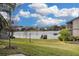 Peaceful lake view with dock and lush landscaping at 144 Maitland Ave # A, Altamonte Springs, FL 32701