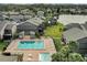 Large rectangular community pool with surrounding patio and lounge chairs at 144 Maitland Ave # A, Altamonte Springs, FL 32701