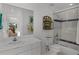 Clean bathroom with a vanity, toilet, and shower at 1611 Walnut Ave, Winter Park, FL 32789