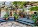 Expansive indoor patio connecting the home to a lush outdoor space at 1611 Walnut Ave, Winter Park, FL 32789