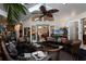 Relaxing sunroom with wicker furniture and skylights at 1611 Walnut Ave, Winter Park, FL 32789